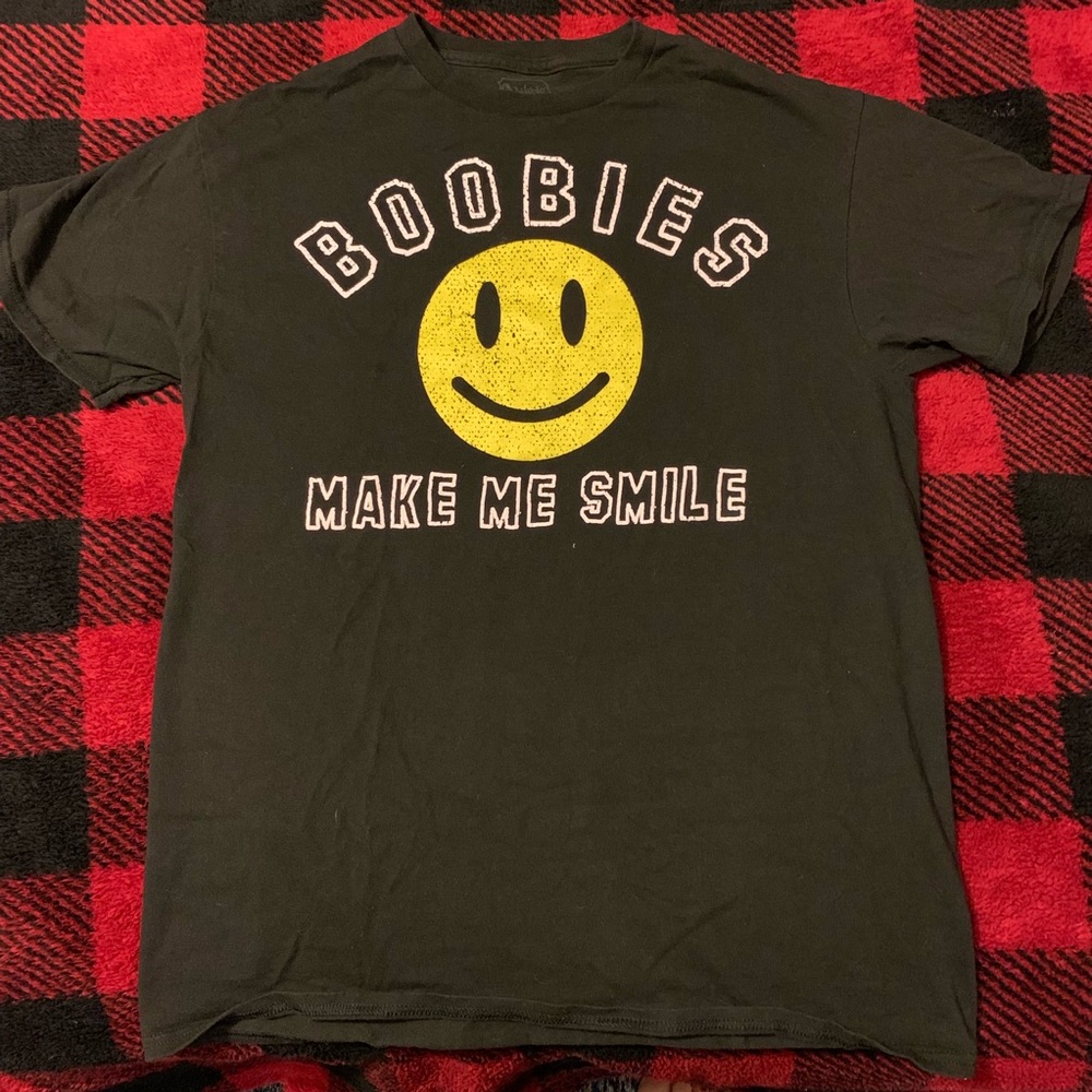 Spencer’s “boobies make me smile” tee
